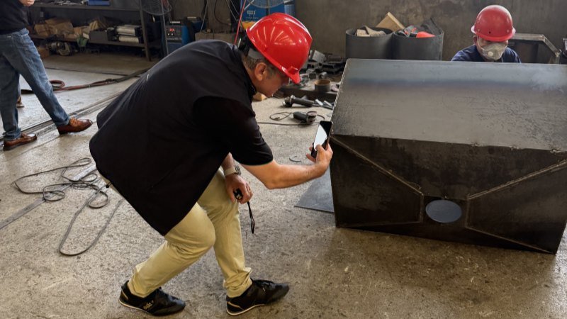 Romanian Client Taking Photos Of Steel Welding Quality