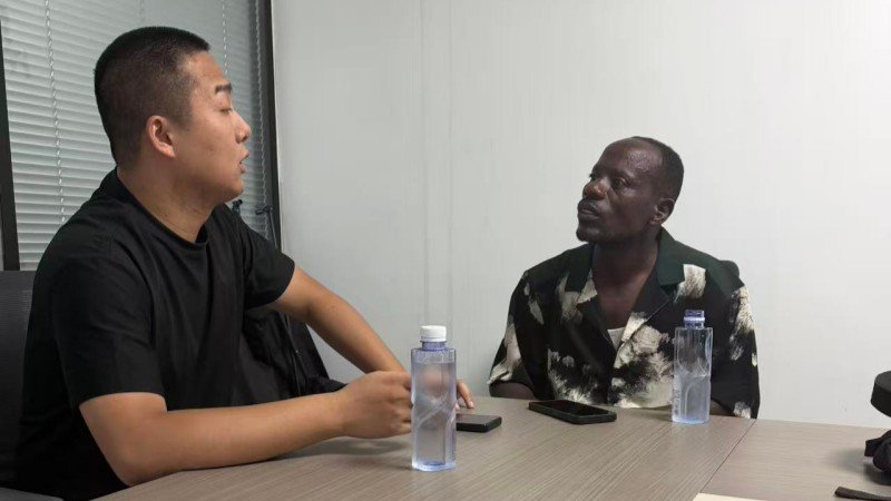 Technical Discussion With African Client In Office