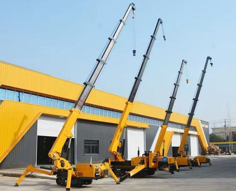 Yellow 16 Ton Tracked Spider Cranes With Outriggers Deployed